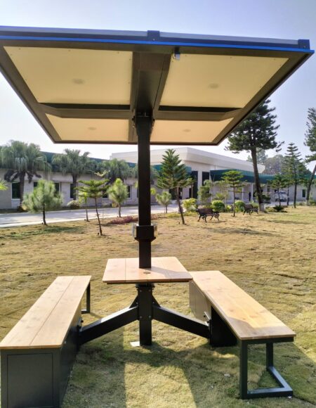 solar ghazebo installed in the garden surrounded with trees