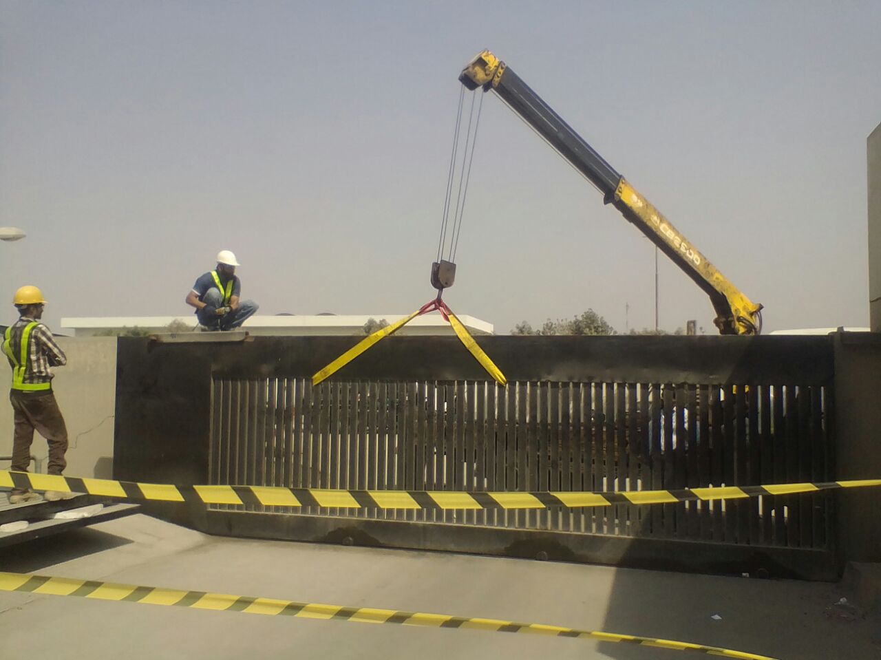 commercial sliding gate installed at factory entrance