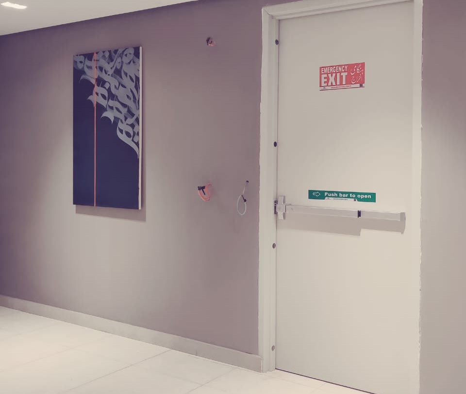 white fire door installed emergancy exit in J7 emporium mall