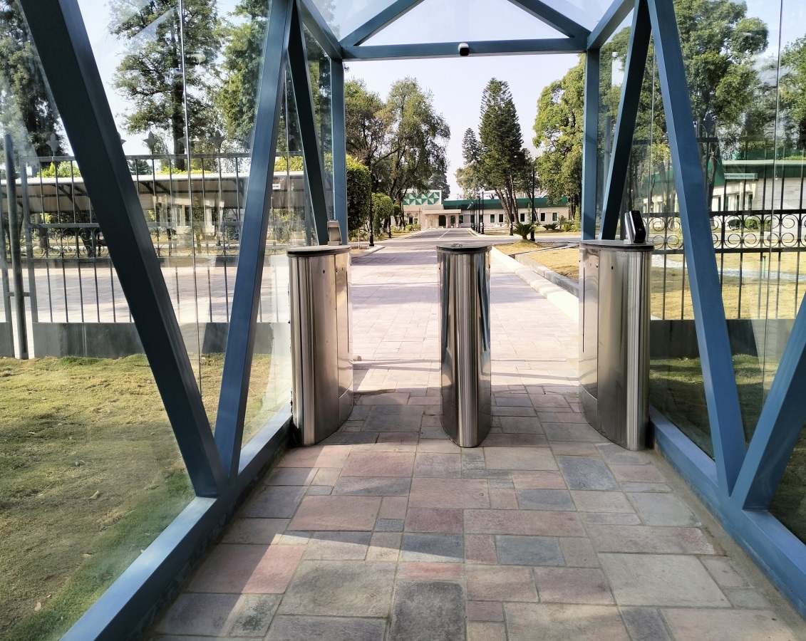 flap barriers installed at organizations entrance for dedicating access