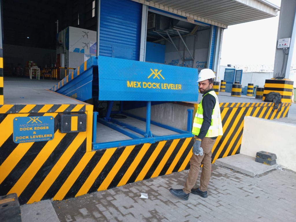 a mechanic testing hydraulic dock