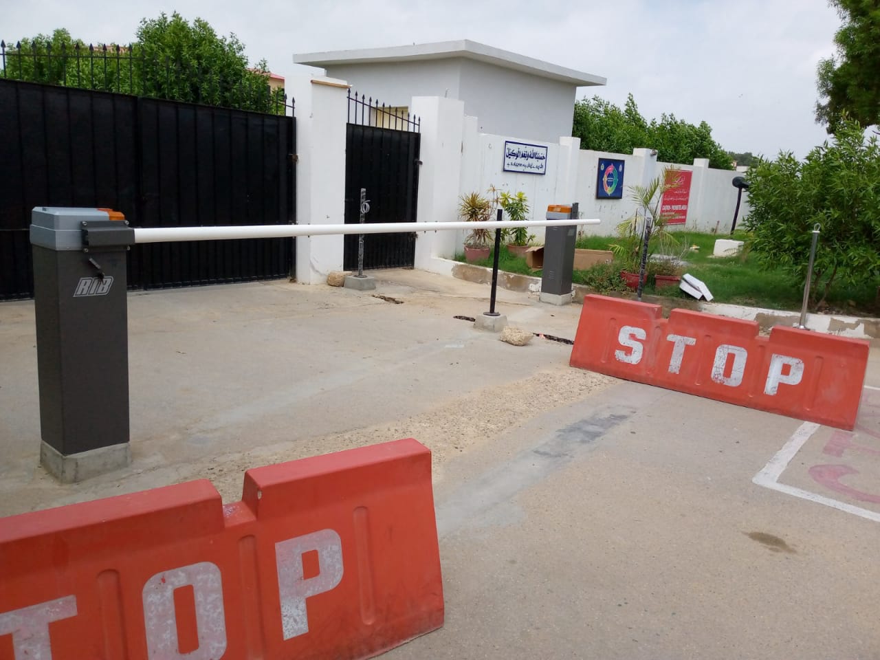 automatic boom barriers installed outside entrance gate