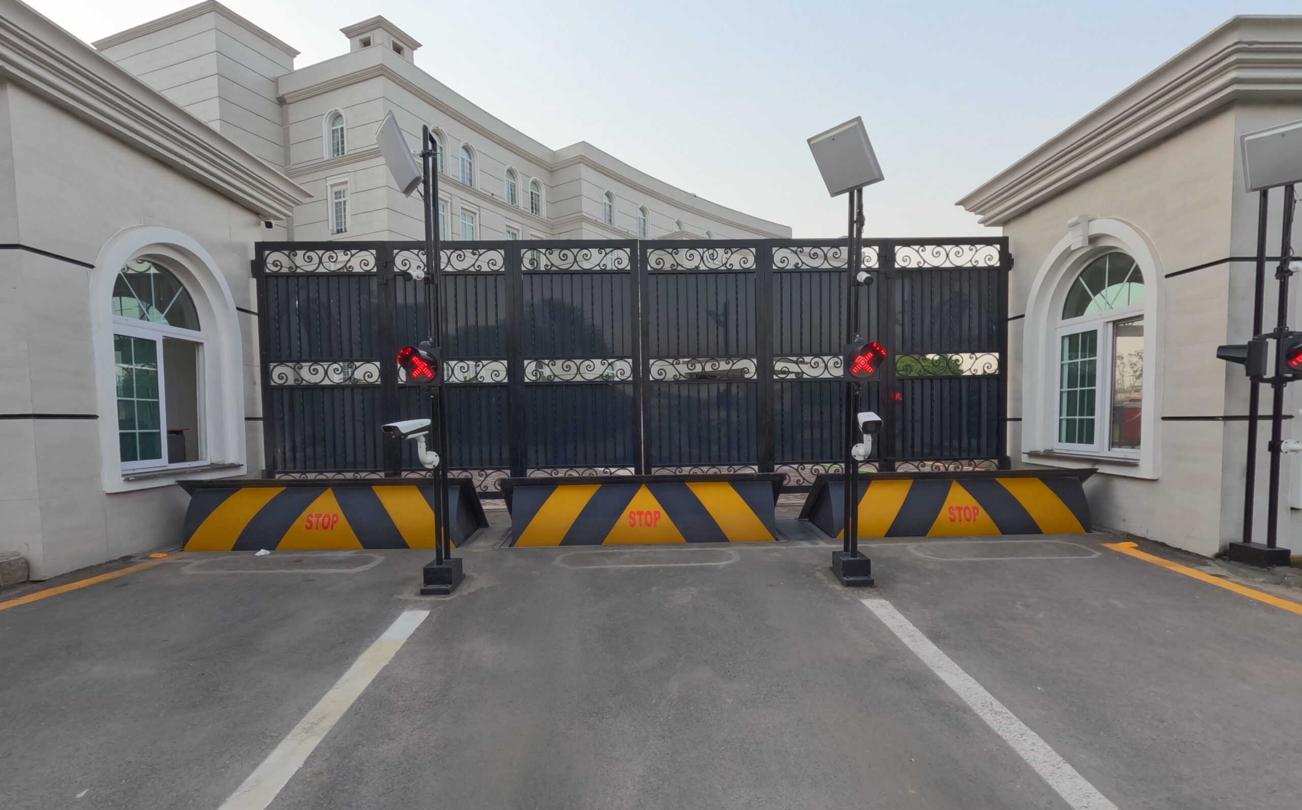 road blockers and access control system installed at entrance for security