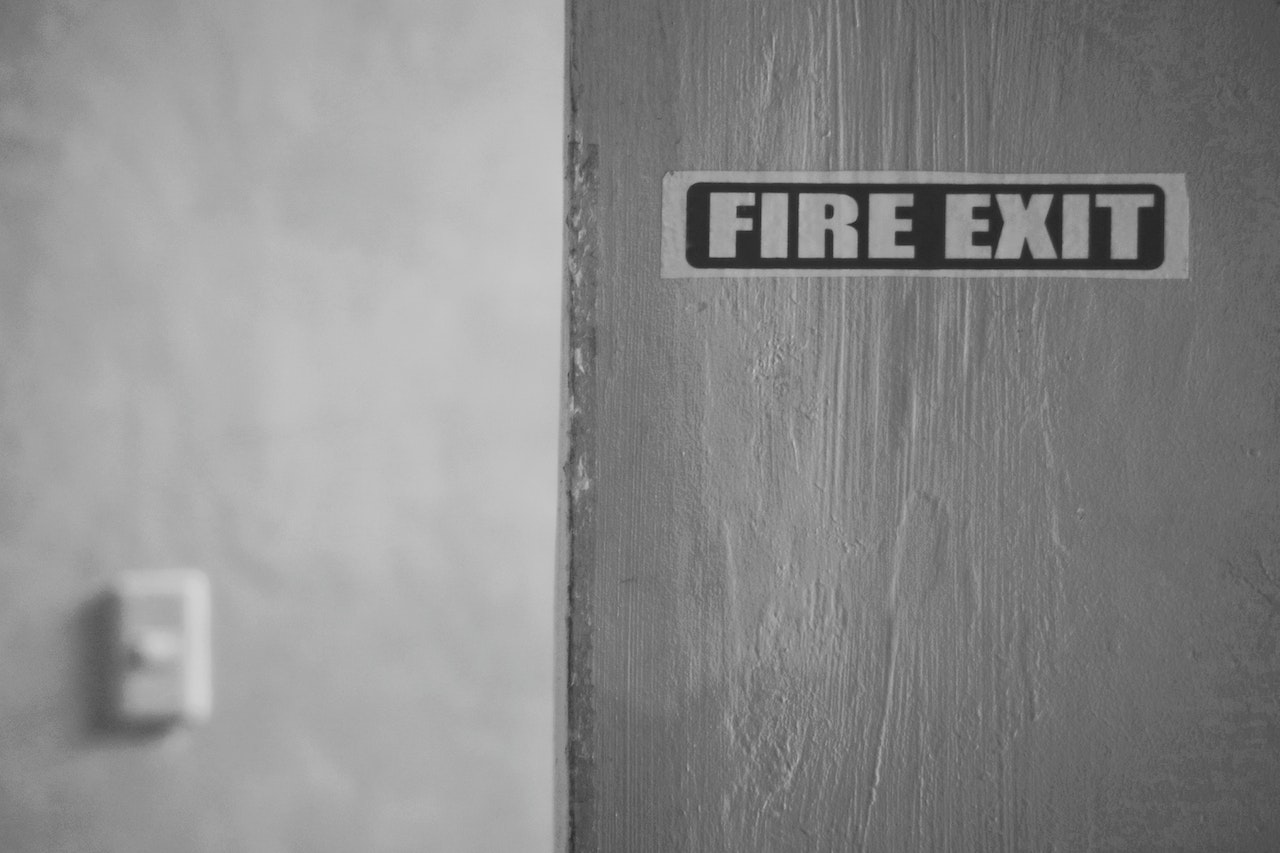 fire exit sign on emergency exit door